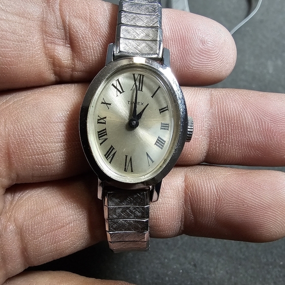 Vintage Timex Ladies Mechanical Wind Up Watch Silver Tone Stretch Band Working s - Picture 1 of 9